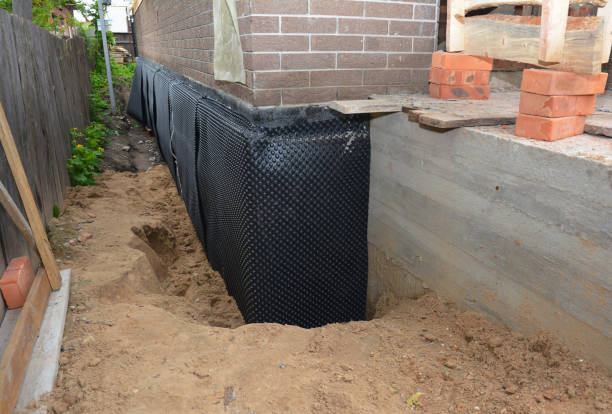 Happy homeowners after waterproofing job in Kingsbury